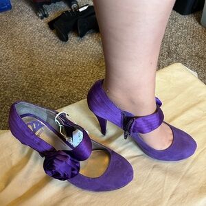 Elegant Purple Heels with Floral Accent